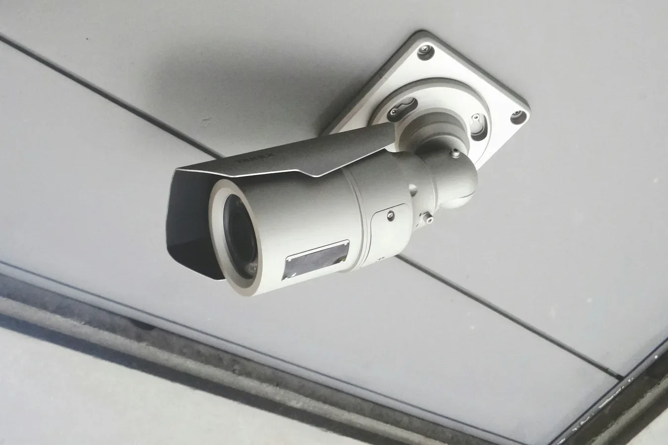 Wall-mounted CCTV security camera reused for NviroView™ AI vision event detection