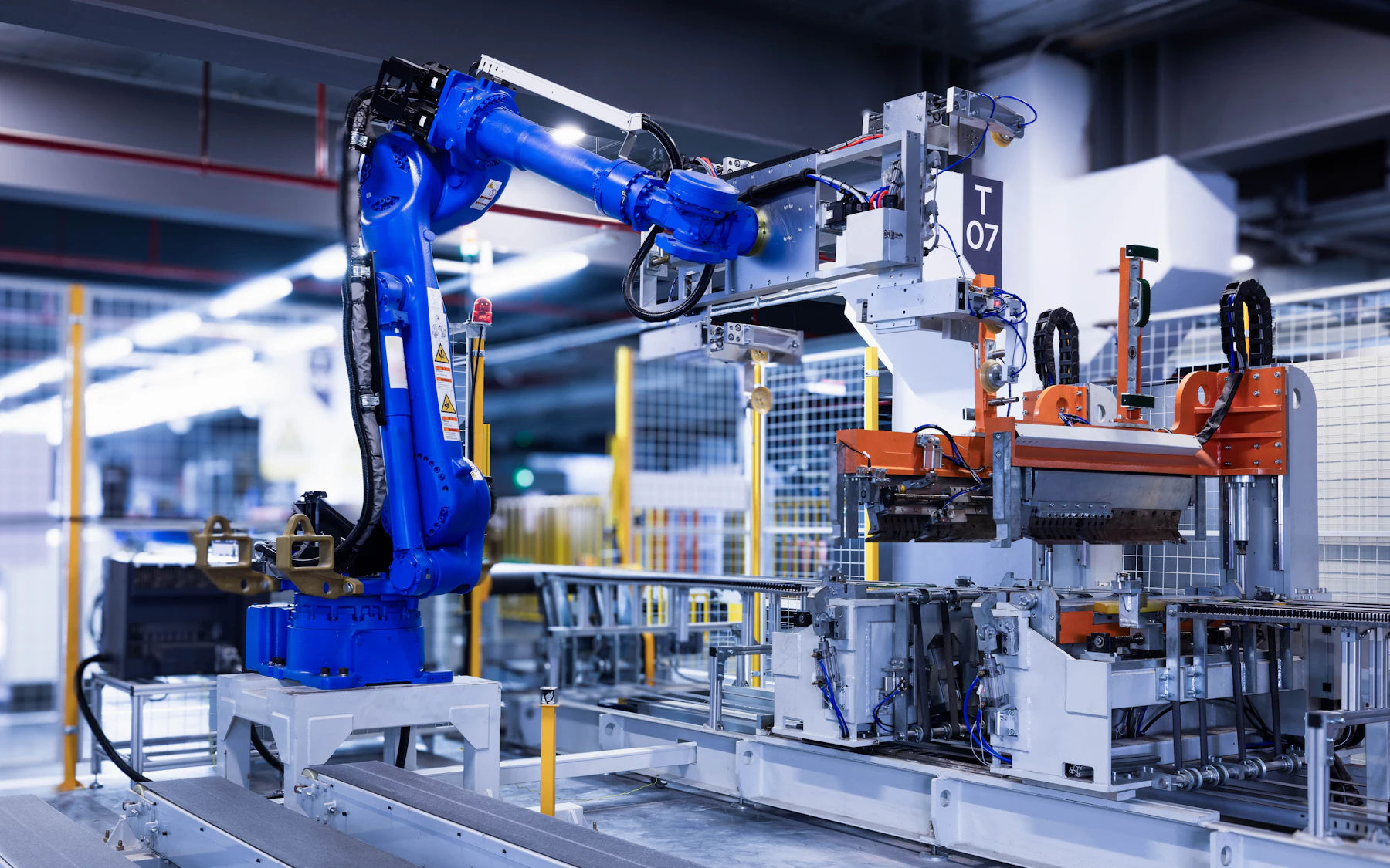 Industrial robot and machine vision system operating on a production line